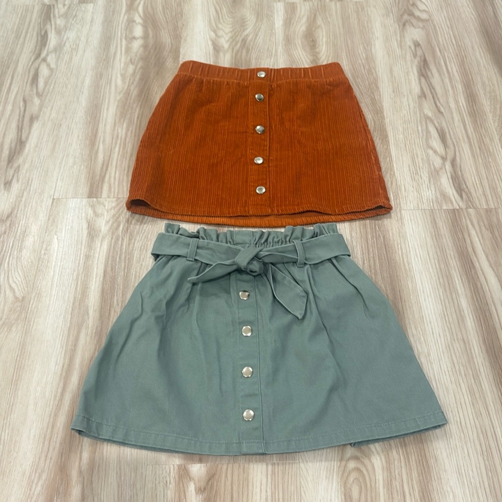 Isaac mizrahi girls 7/8 skirts.Green denim with tie belt. Burnt orange corduroy